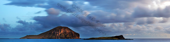 Sunset and waves over Manana and Kaohikaipu Islands, or Rabbit and Flat Islands, near Makapuu Oahu Hawaii