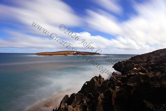 Night exposure during full moon of Kukuihoolua Island Laie Point Oahu Hawaii