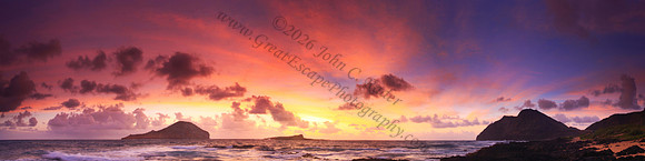 Sunrise and waves over Manana and Kaohikaipu Islands, or Rabbit and Flat Islands, near Makapuu lighthouse and Beach Oahu Hawaii