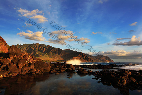Sunset over Waianae Coast Makua Valley sailboat Oahu Hawaii leeward