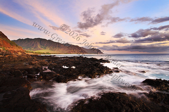 Sunset over Waianae Coast Makua Valley sailboat Oahu Hawaii leeward