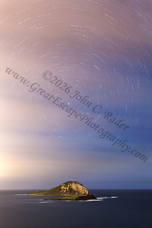 Long exposure night sky Rabbit Island Makapuu Oahu Hawaii