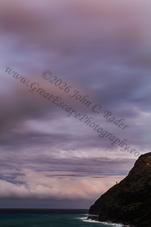 Sunset at Makapuu beach and lighthouse overlooking Rabbit Island on Oahu Hawaii