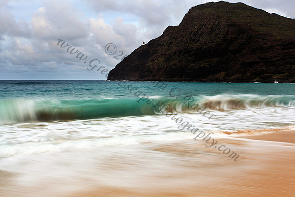 Sunset and waves over Manana and Kaohikaipu Islands, or Rabbit and Flat Islands, near Makapuu Oahu Hawaii
