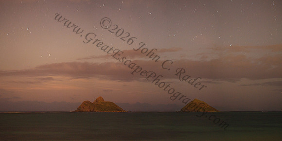 Moonrise over Mokulua Nui and Mokulua Iki islands in Lanikai, Oahu Hawaii