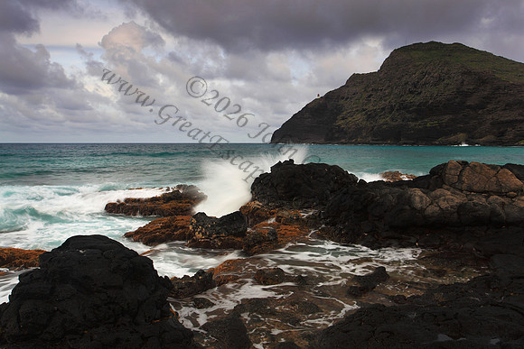 Sunset and waves over Manana and Kaohikaipu Islands, or Rabbit and Flat Islands, near Makapuu Oahu Hawaii