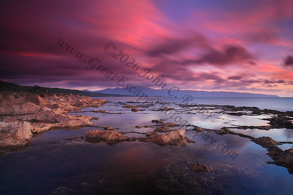 Sunset as seen from Keiki Beach, found on North Shore of Oahu Hawaii