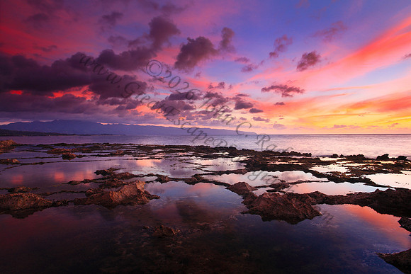 Sunset as seen from Keiki Beach, found on North Shore of Oahu Hawaii