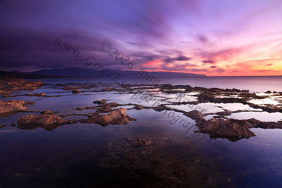 Sunset as seen from Keiki Beach, found on North Shore of Oahu Hawaii
