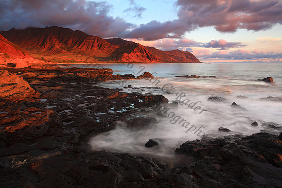 Sunset looking into Makua Bay during large waves, Oahu Hawaii