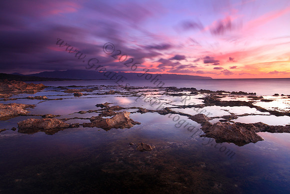 Sunset as seen from Keiki Beach, found on North Shore of Oahu Hawaii