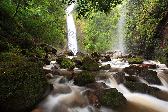 Heavy rain Lulumahu Falls tucked in the Koolau Mountains in Nuuanu Valley, Oahu, Hawaii