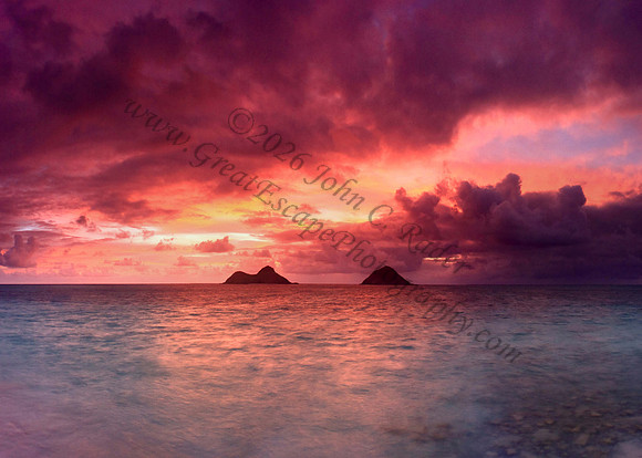 Vibrant sunrise over Mokulua Islands, Lanikai Oahu Hawaii