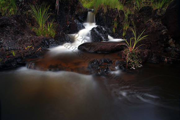 Small waterfall on Wailuku River in Hilo Hawaii Big Island