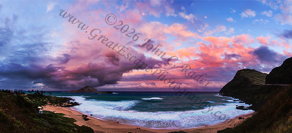 Sunset at Makapuu beach and lighthouse overlooking Rabbit Island on Oahu Hawaii