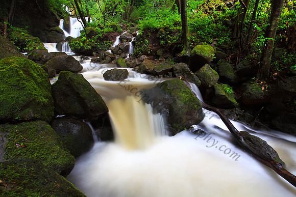 Heavy rain Lulumahu Falls tucked in the Koolau Mountains in Nuuanu Valley, Oahu, Hawaii