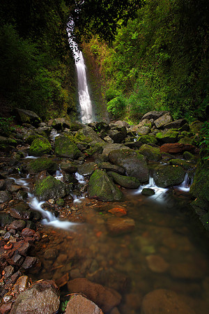 Heavy rain Lulumahu Falls tucked in the Koolau Mountains in Nuuanu Valley, Oahu, Hawaii