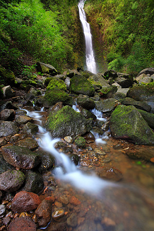 Heavy rain Lulumahu Falls tucked in the Koolau Mountains in Nuuanu Valley, Oahu, Hawaii
